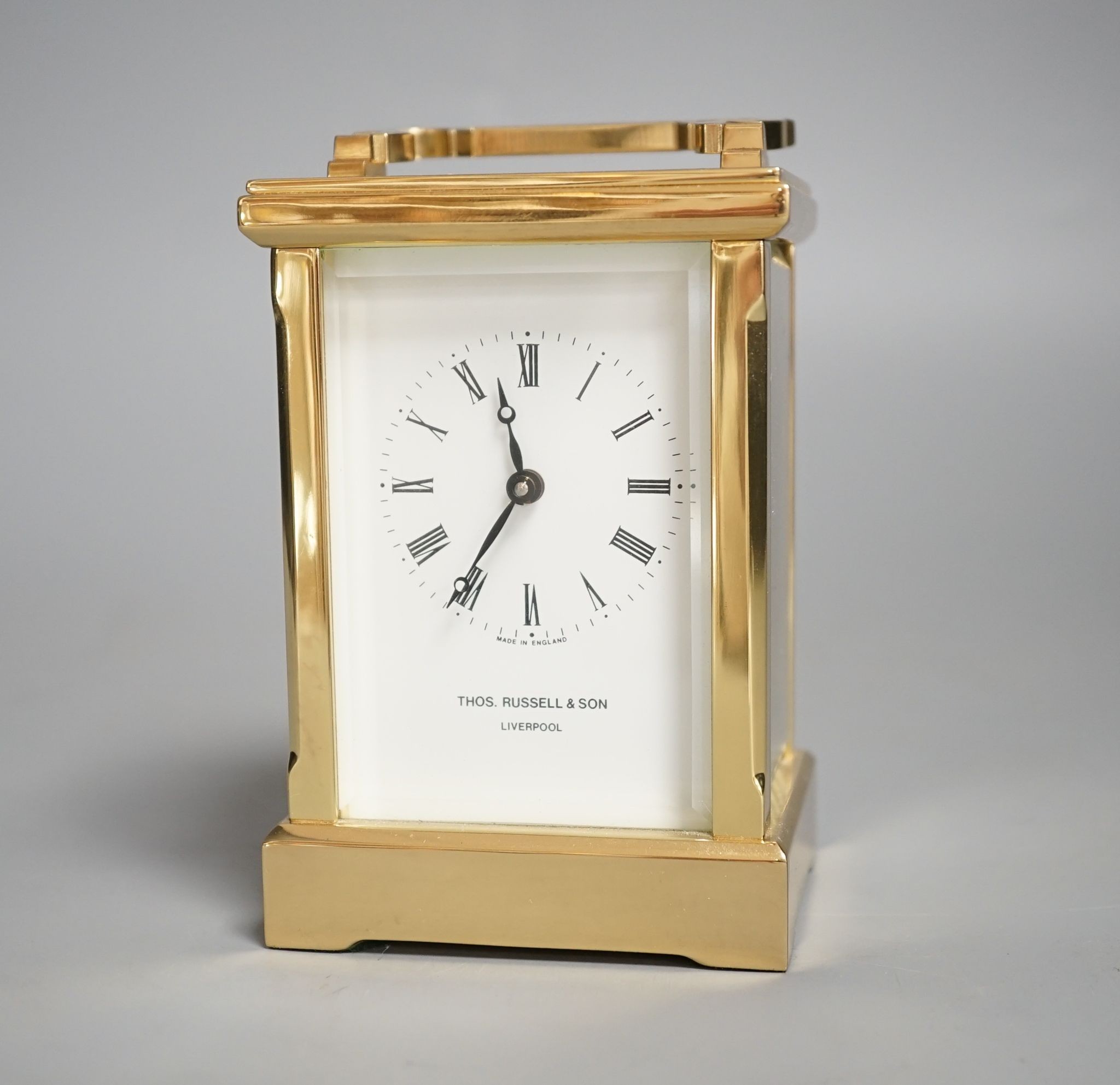 A Thos. Russell &Son brass carriage timepiece with key